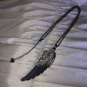 Long black necklace with wing